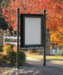 Subdivision message center with bottom panel