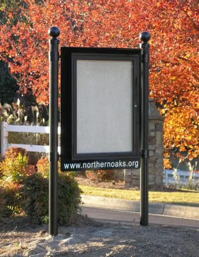Subdivision message center with bottom panel